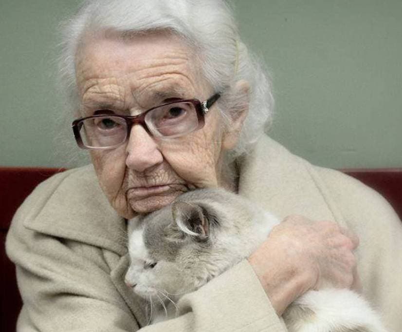 Older woman with a cat