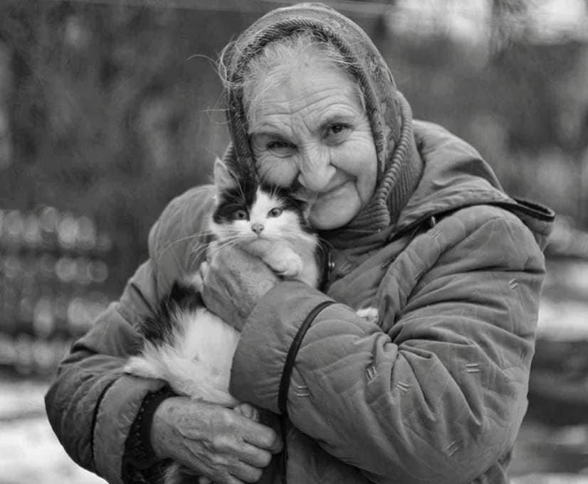 Older woman with a cat