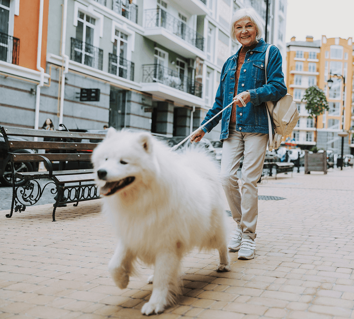 Neighbor with their dog in a community setting — Guardian Pet Trust community partner program